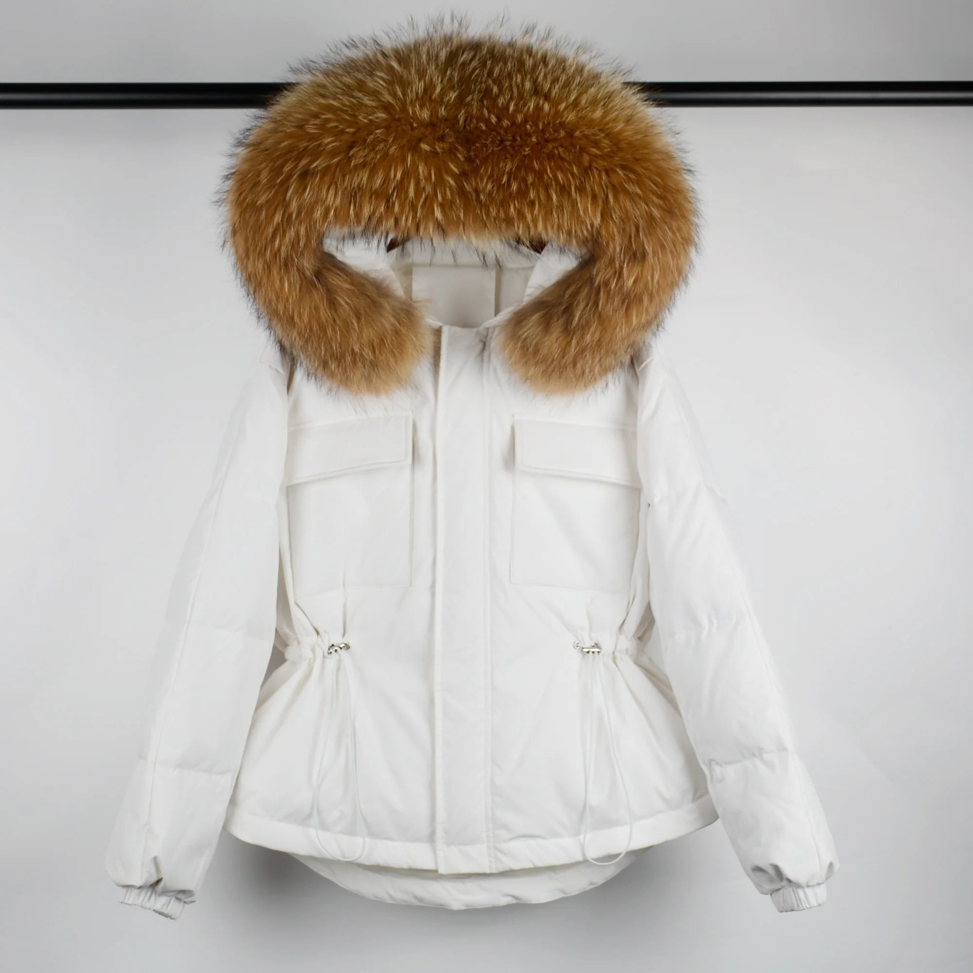 White jacket with brown furry cap